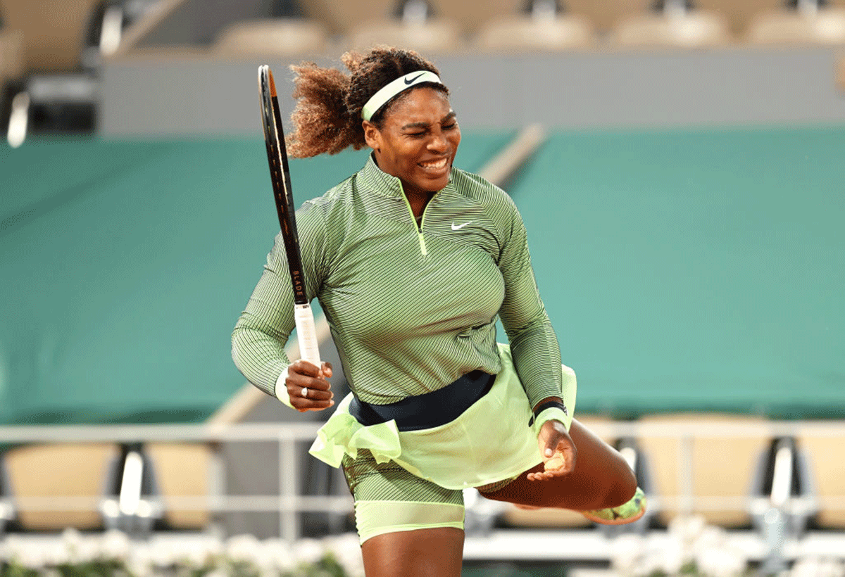 Serena Williams reacts during her first round match against Irina-Camelia Begu of Romania 