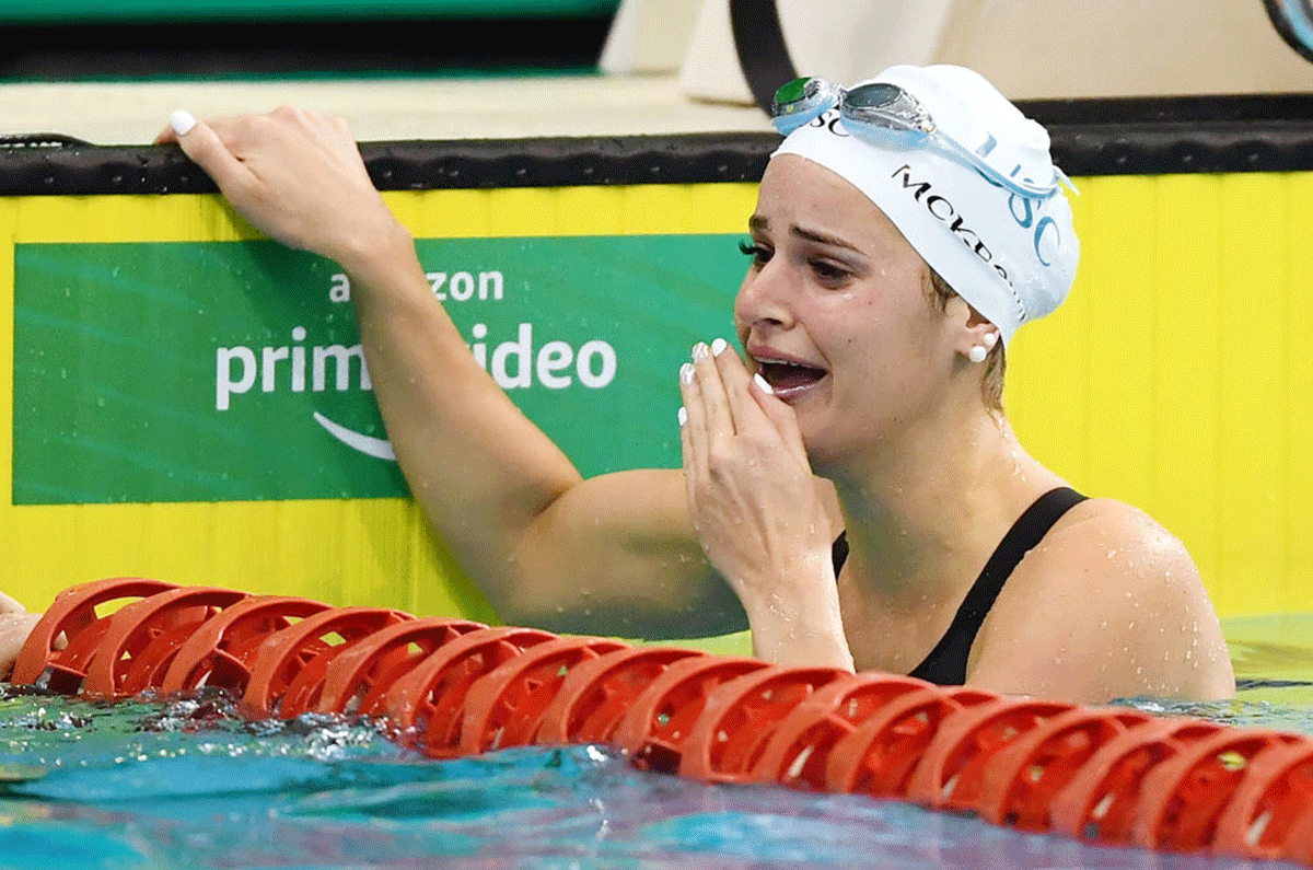 Kaylee McKeown in tears after breaking the the world record in the women's 100 metre backstroke final during the Australian National Olympic Swimming Trials at SA Aquatic & Leisure Centre in Adelaide on Sunday
