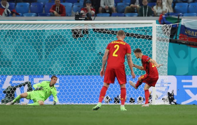 Thomas Meunier scores Belgium's second goal past Russia's Anton Shunin