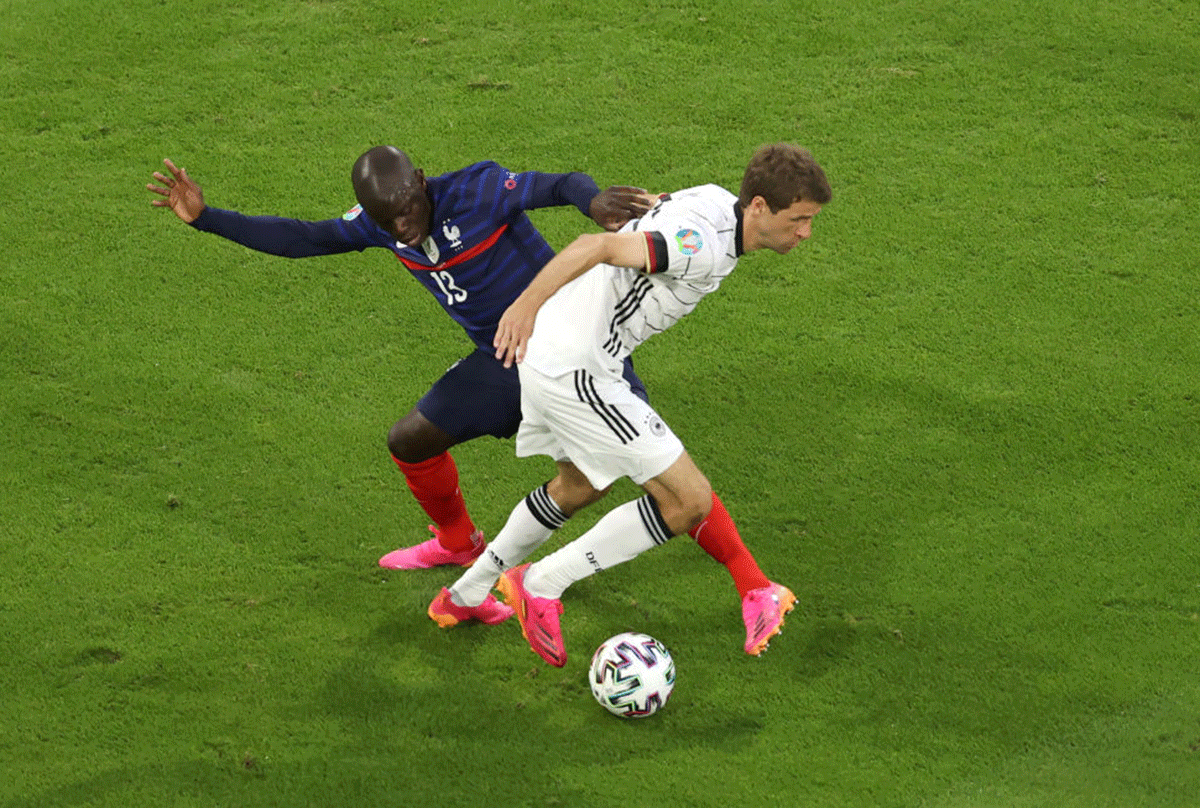 Germany's Thomas Mueller is challenged by France's N'Golo Kante during their Euro 2020 Championship Group F match at Football Arena Munich in Munich, Germany, on Tuesday