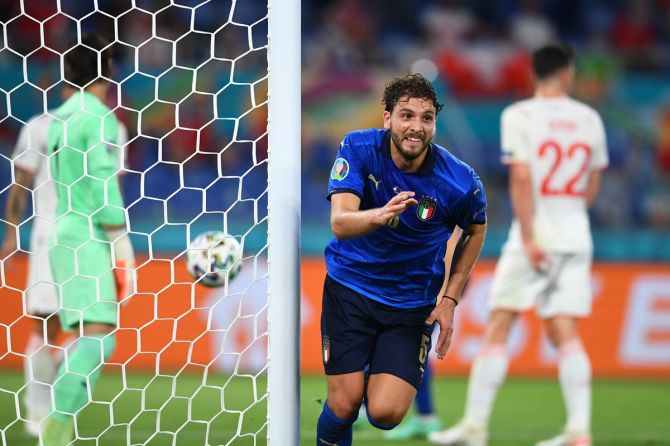 Manuel Locatelli celebrates after putting Italy ahead during the Euro 2020 Group A match against Switzerland