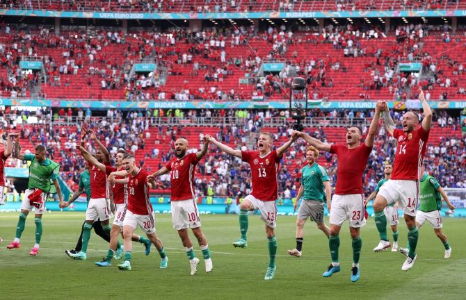 Roland Sallai, Tamas Cseri, Andras Schaefer, Nemanja Nikolic and Gergo Lovrencsics celebrate in front of home fans after holding World champions France 1-1.
