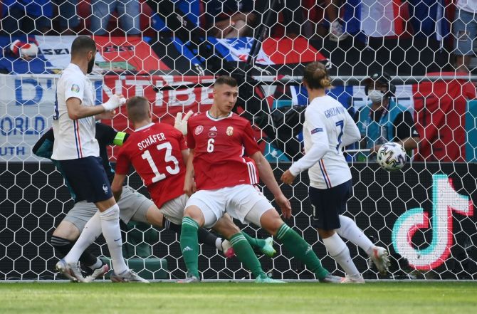 France's Antoine Griezmann scores against Hungary, at Puskas Arena, in Budapest.