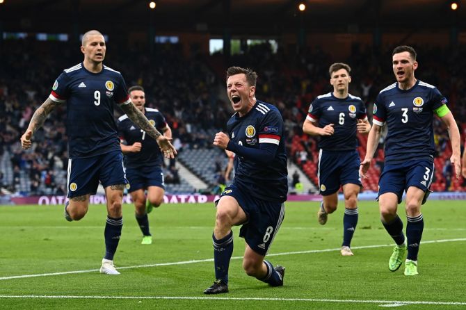 Callum McGregor celebrates after restoring parity for Scotland.