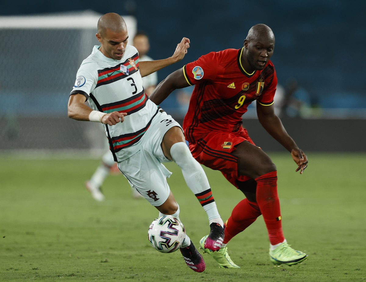 Portugal defender Pepe denies Belgium striker Romelu Lukaku the ball.