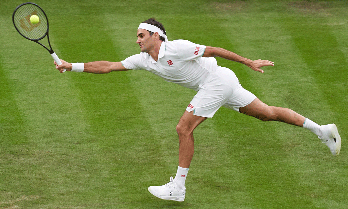 Roger Federer in action against Frenchman Adrian Manarinoo in first match.