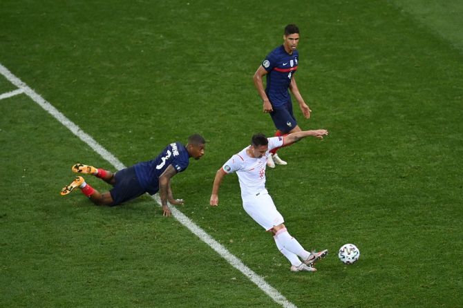 Mario Gavranovic scores Switzerland's third goal to take the match to extra-time