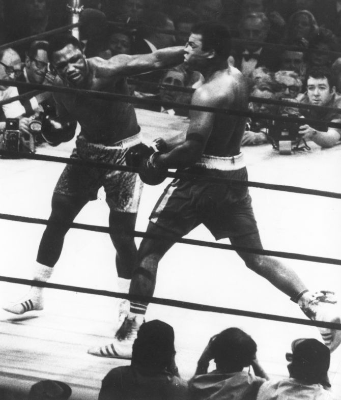 The World Heavyweight title fight between Joe Frazier (left) and Muhammad Ali at Madison Square Garden, New York City, 8th March 1971.