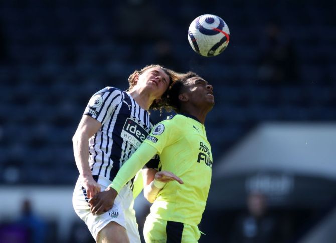 West Bromwich Albion's Conor Gallagher and Newcastle United's Joseph Willock in an aerial battle 