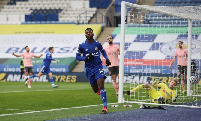 Kelechi Iheanacho celebrates scoring Leicester City's first goal.