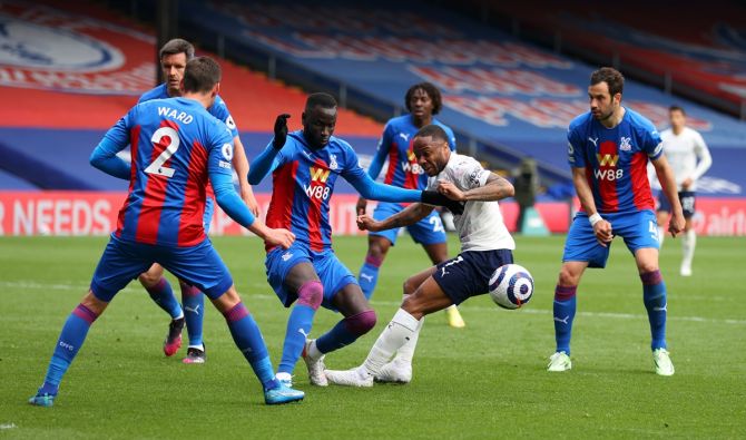 Manchester City's Raheem Sterling tries to make his way past Crystal Palace's Cheikhou Kouyate, Scott Dann, Eberechi Eze, Luka Milivojevic and Joel Ward. 