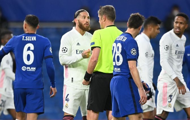 Real Madrid's Sergio Ramos after being shown a yellow card by referee Daniele Orsato