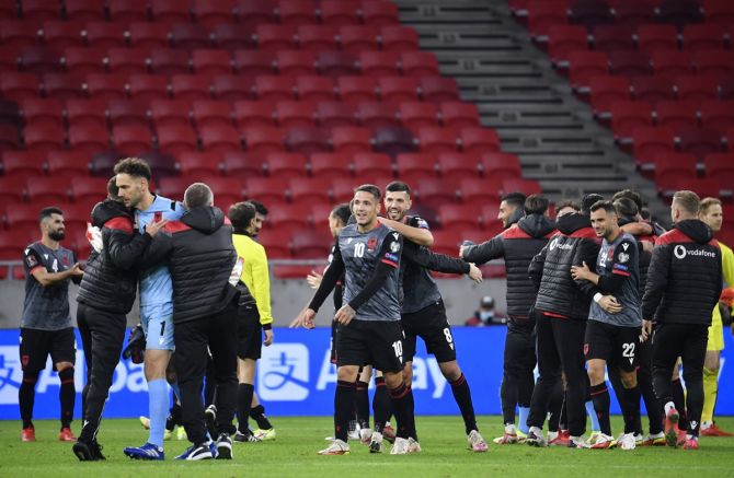 Albania's players celebrate after victory over Hungary, at Puskas Arena, Budapest, Hungary, on Saturday. 