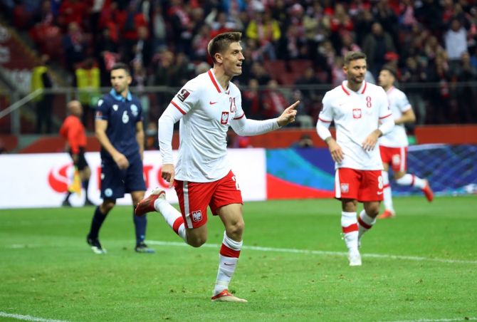 Krzysztof Piatek celebrates scoring Poland's fifth goal in the UEFA Group 1 World Cup qualifier against San Marino