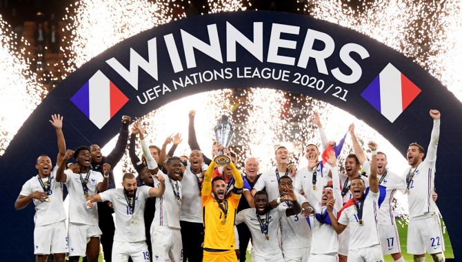 France's players celebrate as captain Hugo Lloris lifts the trophy after victory over Spain in the Nations League final in Milan, Italy, on Sunday.