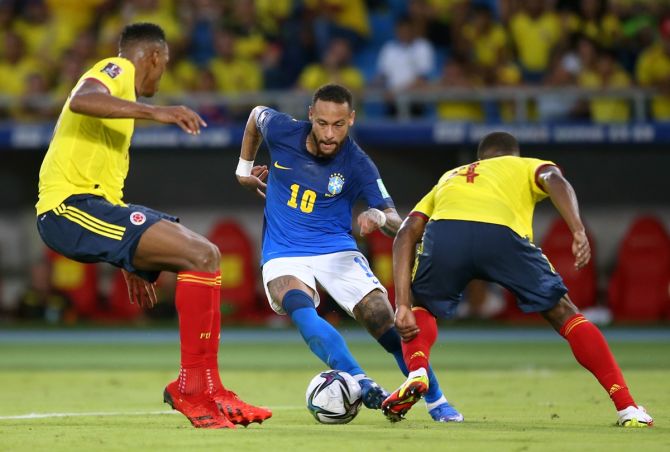 Brazil striker Neymar tries to work his way past Colombia's defence during the South American World Cup qualifier at Estadio Metropolitano Roberto Melendez, in Barranquilla, Colombia, on Sunday.
