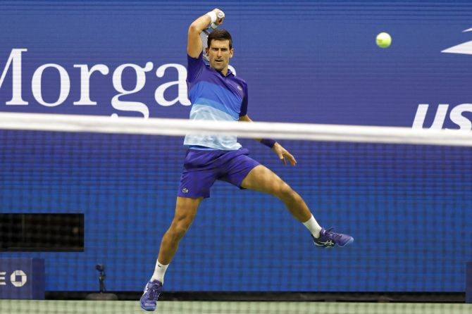 Serbia's Novak Djokovic hits a forehand during his first round match against Denmark's Holger Vitus Nodskov Rune at the US Open on Tuesday.