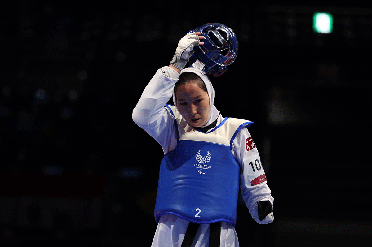 Zakia Khudadadi of Afghanistan during her bout against Viktoriia Marchuk of Ukraine in the Women K44 -49kg Taekwondo quarter-final at the Paralympic Games in Chiba, Japan, on Thursday 