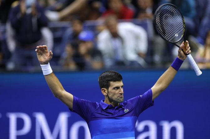 Serbia's Novak Djokovic celebrates victory over Germany's Alexander Zverev in the US Open men's singles semi-finals on Friday.