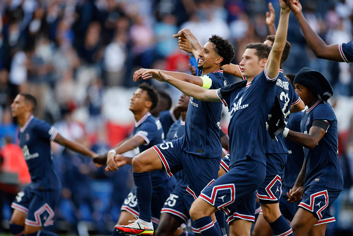 Paris St Germain's players celebrate after the match against Clermont on Saturday