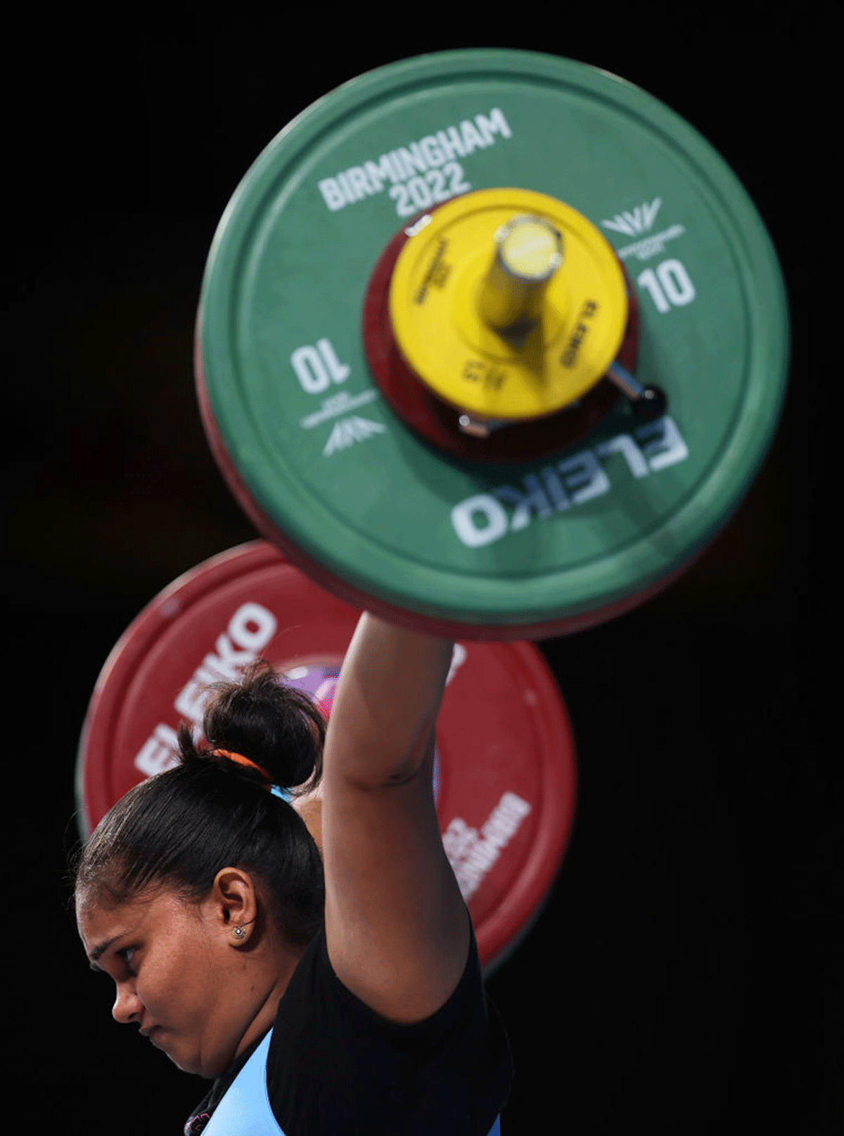 India's Usha Bannur performs a snatch during the Women's Weightlifting 87kg Final on day five of the Birmingham 2022 Commonwealth Games at NEC Arena in Birmingham on Tuesday.