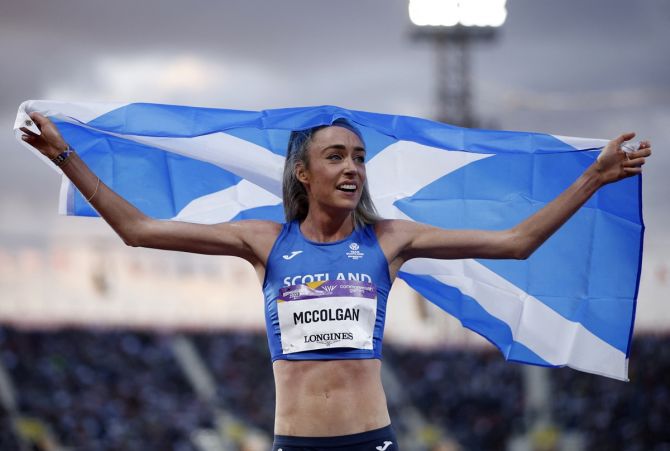 Scotland's Eilish Mccolgan celebrates after winning the women's 10,000 metres.