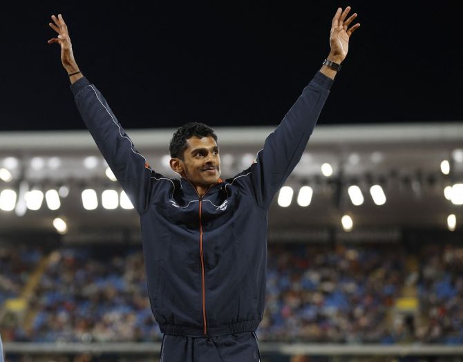 Silver medallist Murali Sreeshankar waves to the crowd from the podium during the medal ceremony for the men's Long Jump at the Commonwealth Games in Birmingham on Thursday.