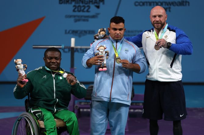 (L-R) Nigeria's Ikechukwu Christian Obichukwu (silver), India's Sudhir (gold) and Scotland's Micky Yule (bronze) during the men's heavyweight Para Powerlifting  medal ceremony