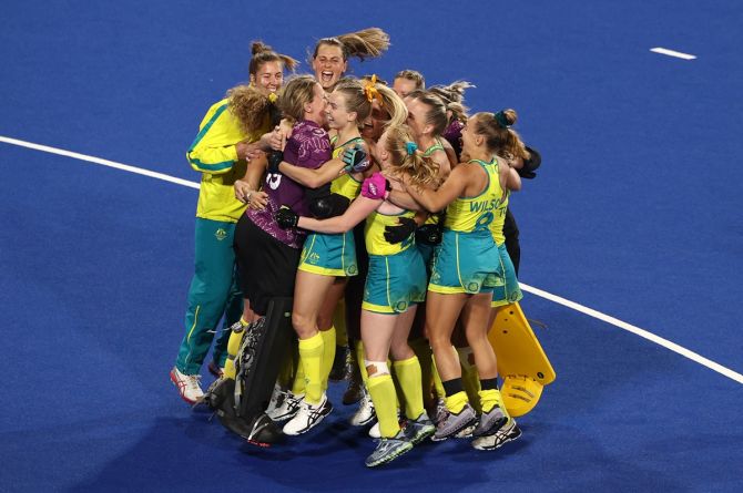 Australia's players celebrate victory.