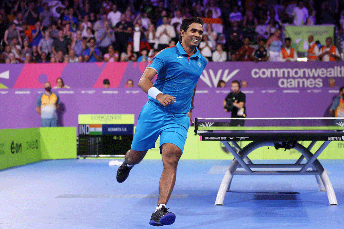 Sharath Kamal celebrates on winning the Table Tennis Men's Singles Gold Medal match against England's Liam Pitchford on Monday 