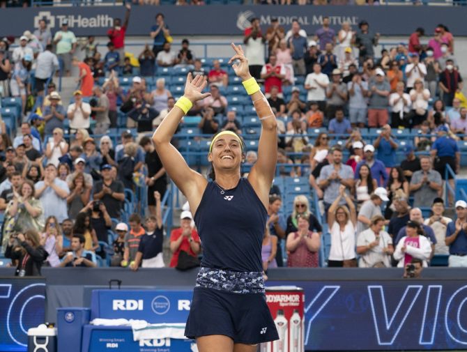 Caroline Garcia celebrates winning her match against Aryna Sabalenka.