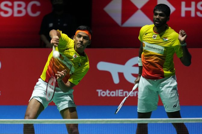 Satwiksairaj Rankireddy, right, and Chirag Shetty in action against Malaysia's Aaron Chia and Soh Wooi Yik during the men's doubles semi-finals of the BWF World Championships, at Tokyo Metropolitan Gymnasium in Tokyo, on Saturday.