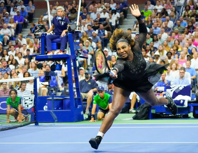 Serena Williams stretches fully for a backhand return against Danka Kovinic.