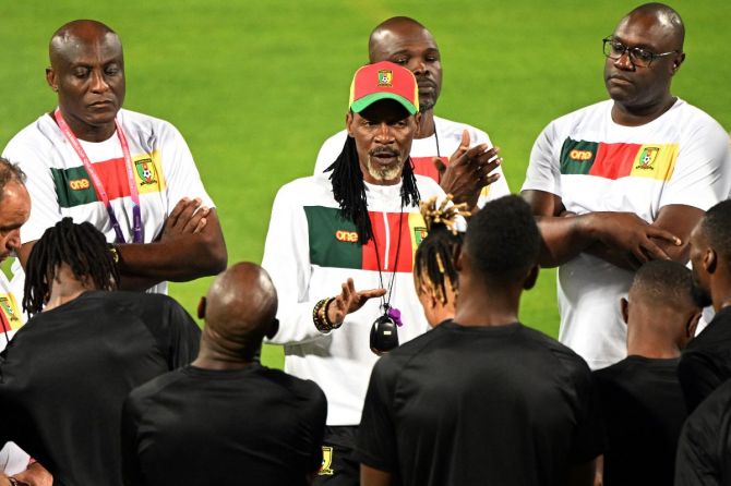Cameroon coach Rigobert Song speaks to the players during training