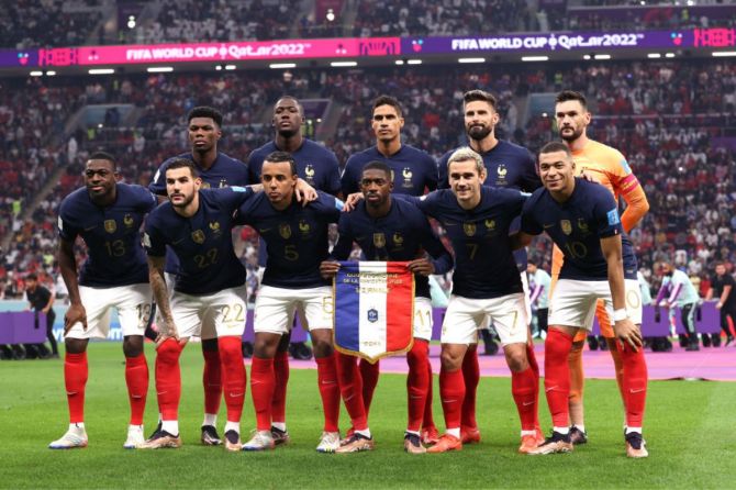 France players line up for the team photos prior to the FIFA World Cup Qatar 2022 semi-final match between France and Morocco
