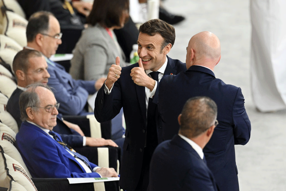 French President Emmanuel Macron arrives for the match