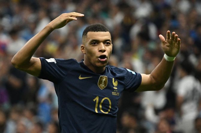 France's Kylian Mbappe celebrates scoring their third goal to complete his hat-trick