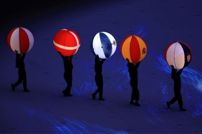 Balls containing the flags of some competing countries are seen in the FIFA World Cup Qatar 2022 closing ceremony 