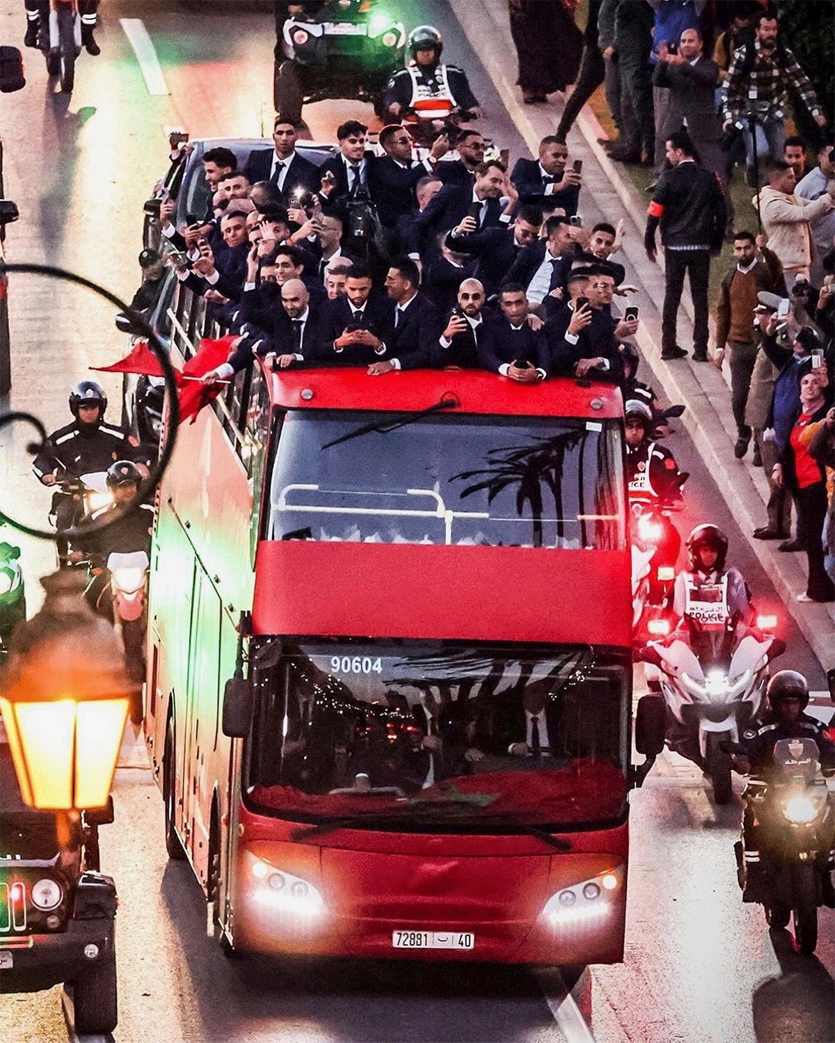 The Moroccon team atop the bus during the parade