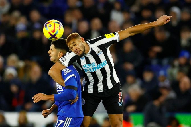 Newcastle United's Joelinton in action with Leicester City's Ayoze Perez