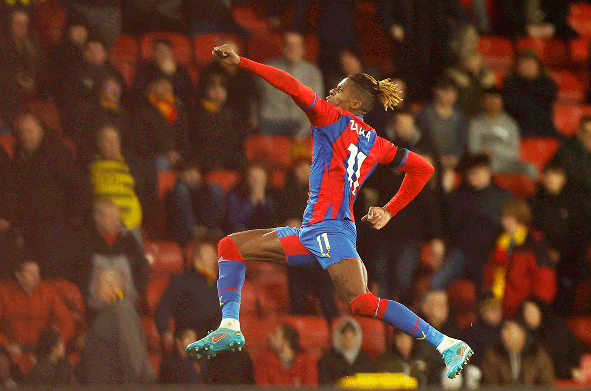 Crystal Palace's Wilfried Zaha celebrates scoring their fourth goal against Watford at Vicarage Road in Watford 