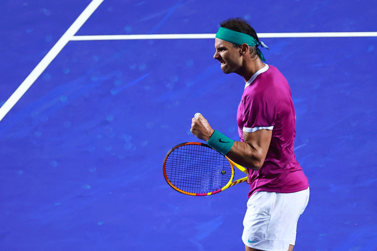 Rafael Nadal celebrates a point against American Tommy Pau