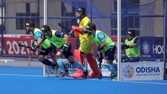 India's senior men's hockey team practises a penalty-corner drill during a training camp in Odisha.
