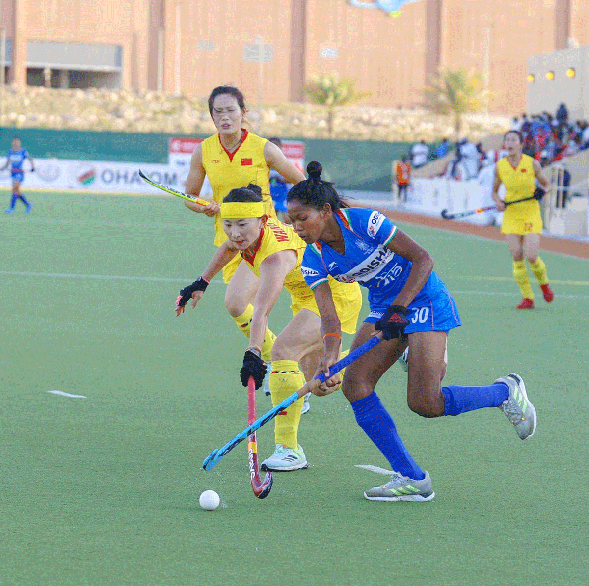 India and China players vie for possession during their Women's Asia Cup hockey bronze medal match in Muscat on Friday