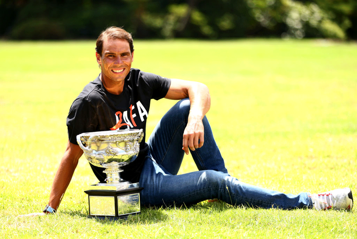 Rafael Nadal poses with the Norman Brookes Challenge Cup at Government House in Melbourne, Australia, on Monday