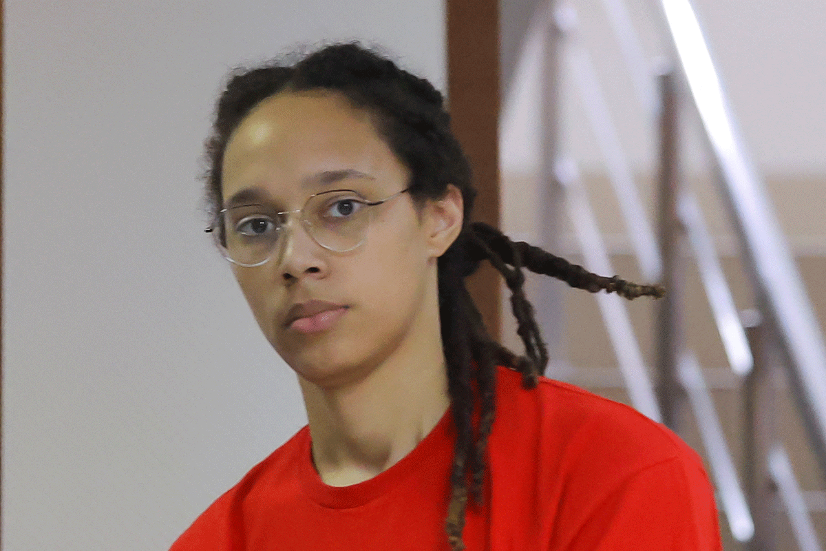US basketball player Brittney Griner, who was detained in March at Moscow's Sheremetyevo airport and later charged with illegal possession of cannabis, is escorted before a court hearing in Khimki, outside Moscow, Russia, on Thursday