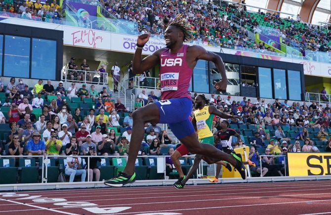 Noah Lyles of the United States crosses the finish line to win the men's 200 metres heat ahead of second-placed Jamaica's Rasheed Dwyer at the World Athletics Championships in Eugene, Oregon, on Monday.