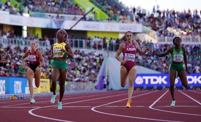 Jamaica's Shelly-Ann Fraser-Pryce wins her semi-final heat ahead of second-placed Abby Steiner of the United States and third-placed Favour Ofili of Nigeria at the World Athletics Championships in Eugene, Oregon, on Tuesday.