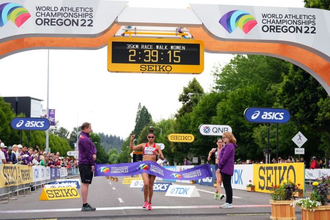 Peru's Kimberly Garcia Leon crosses the line to win the women's 35 kilometres race walk.