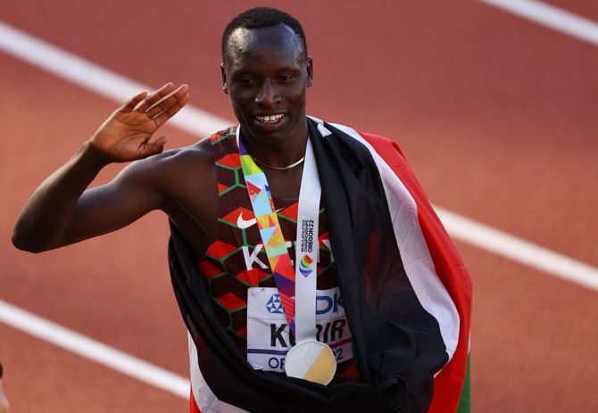 Kenya's Emmanuel Kipkurui Korir celebrates with his gold medal from the men's 800 metres.